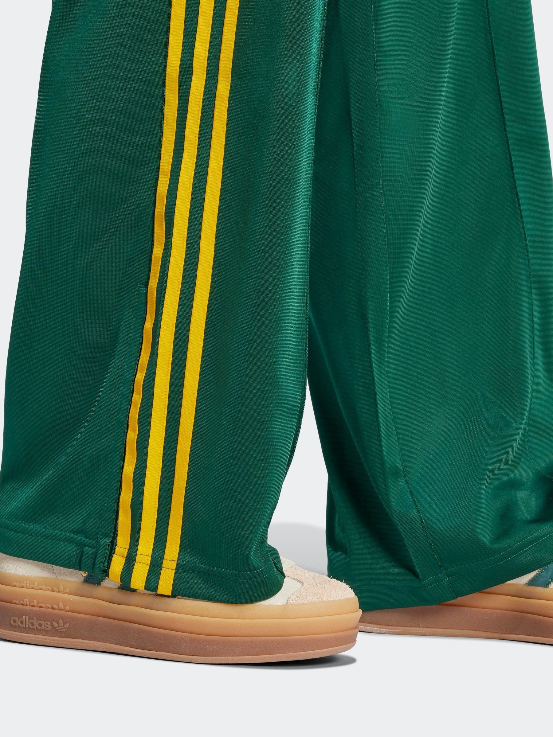 Buy adidas Originals Green Firebird Loose Track Pant Trousers from