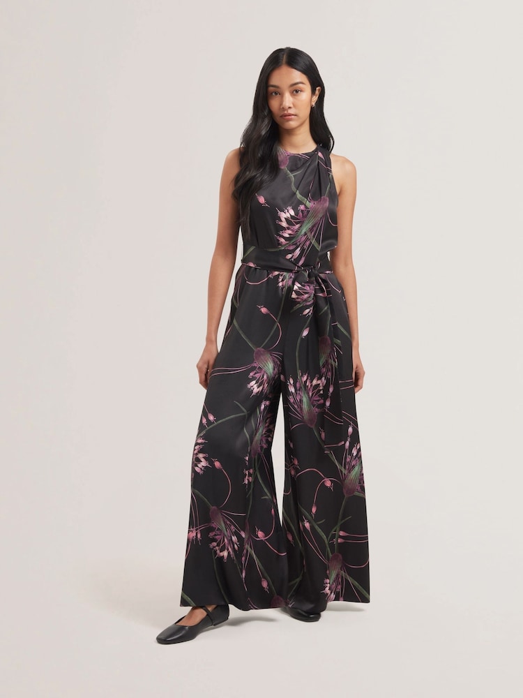 Ted Baker Black Beckkie Printed Wide Leg Jumpsuit with Pleat Detail - Image 1 of 5 Ted Baker Black Beckkie Printed Wide Leg Jumpsuit with Pleat Detail - Image 1 of 5
