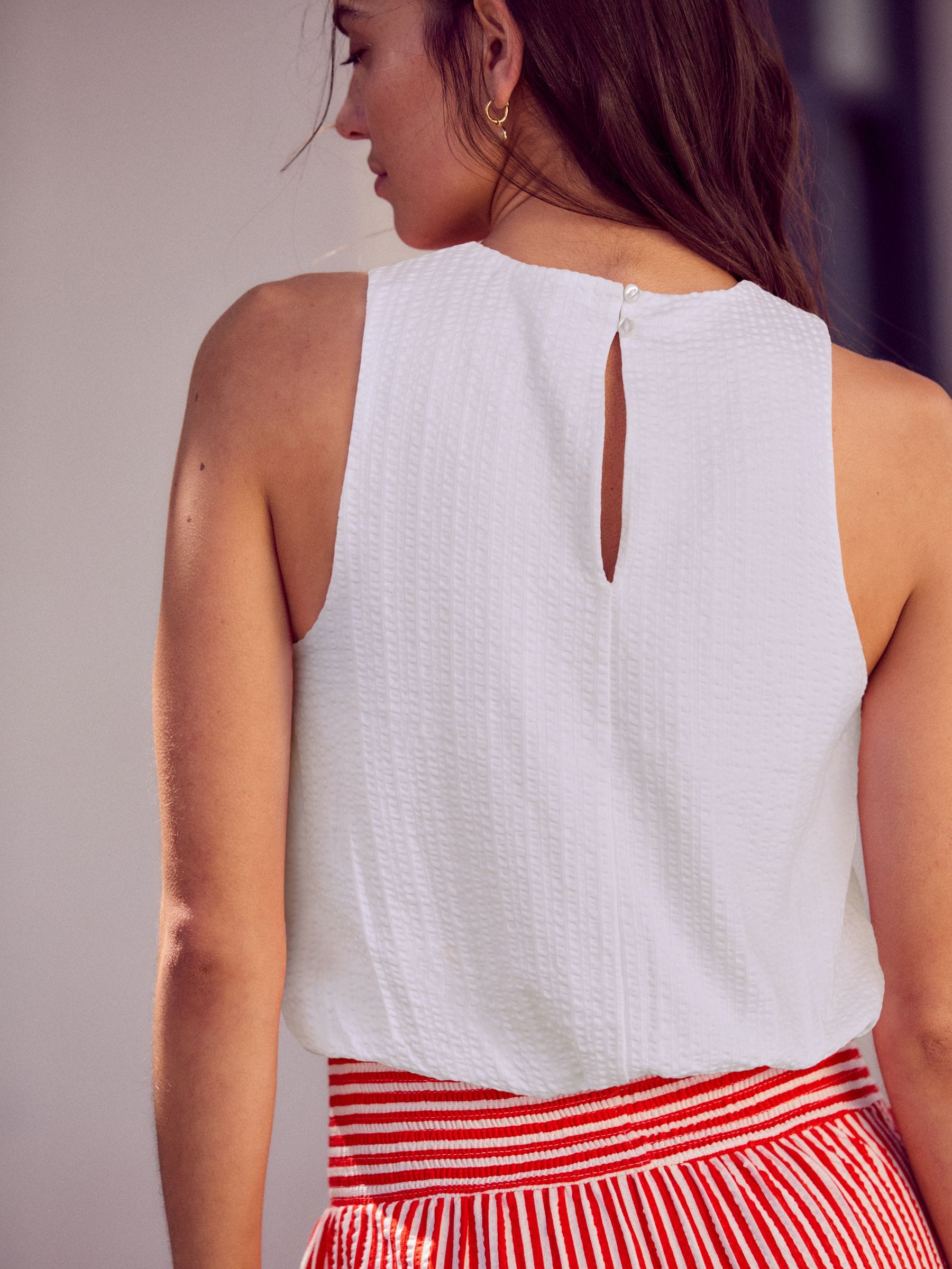 Buy White Sleeveless Bubble Hem Top from Next Canada