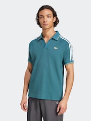 adidas Originals Teal Blue Holiday Waffle Polo Shirt - Image 1 of 6