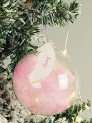 Personalised Pink Feather Christmas Glass Bauble by PMC - Image 1 of 3