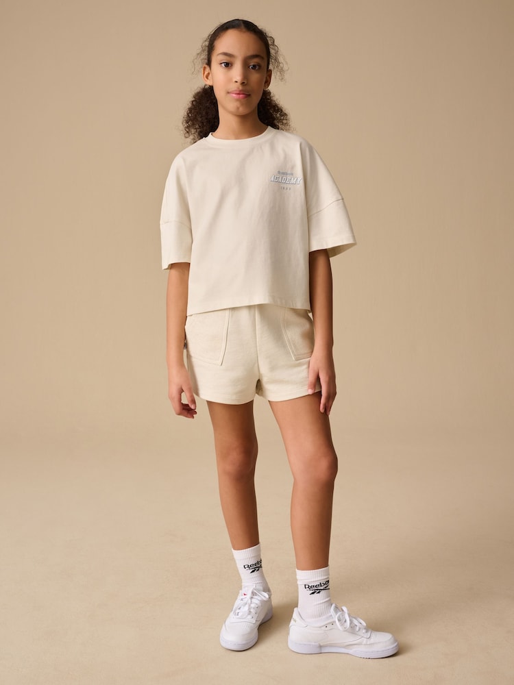Reebok Girls Cream Graphic 100% Cotton T-Shirt and Short Set - Image 1 of 9