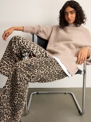 Leopard - Bedruckte Jeans mit weitem Bein aus 100 % Baumwolle - Bild 1 von 5