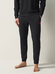HUGO Black Logo Print Stretch Cotton Tracksuit Bottoms - Image 1 of 4