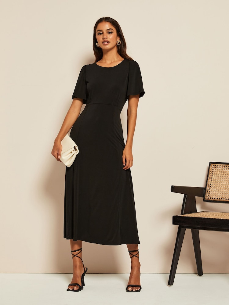 Friends Like These Black Petite ITY Flutter Short Sleeve Midi Dress - Image 1 of 4