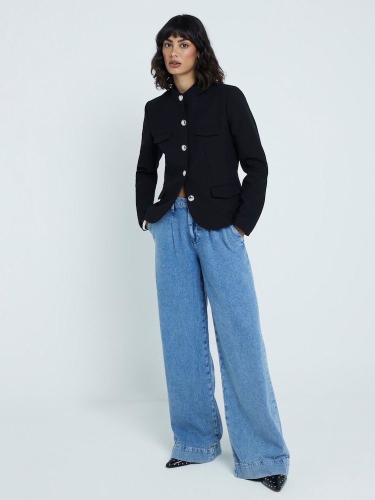 River Island Baggy-Jeans in Tailored-Fit mit mittelhohem Bund - Bild 1 von 4 River Island Baggy-Jeans in Tailored-Fit mit mittelhohem Bund - Bild 1 von 4