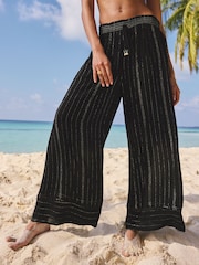 Lipsy Black Petite Wide Leg Sparkle Stripe Beach Trousers - Image 1 of 4