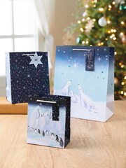 Hallmark 3 Pack Blue Christmas Gift Bags in 3 Arctic Designs - Image 1 of 4