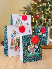 Hallmark 4 Pack Green Christmas Gift Bags in 2 Peter Rabbit Designs - Image 1 of 4
