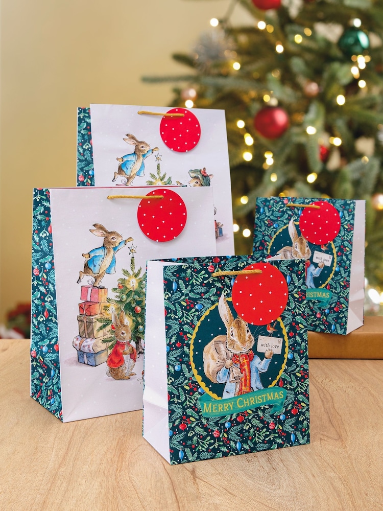 Hallmark 4 Pack Green Christmas Gift Bags in 2 Peter Rabbit Designs - Image 1 of 4