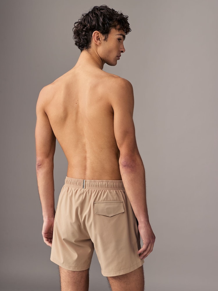Бежевый - BOSS Tio Logo Quick Dry Swim Shorts - Изображение 2 из 4 Бежевый - BOSS Tio Logo Quick Dry Swim Shorts - Изображение 2 из 4