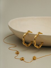 Orelia London Gold Tone Woven Twist & Cross Mid-Size Hoop Earrings - Image 2 of 3