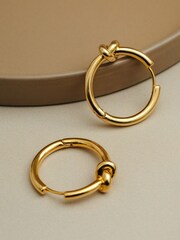 Orelia London Gold Tone Polished Knot Mid Size Hoop Earrings - Image 2 of 3