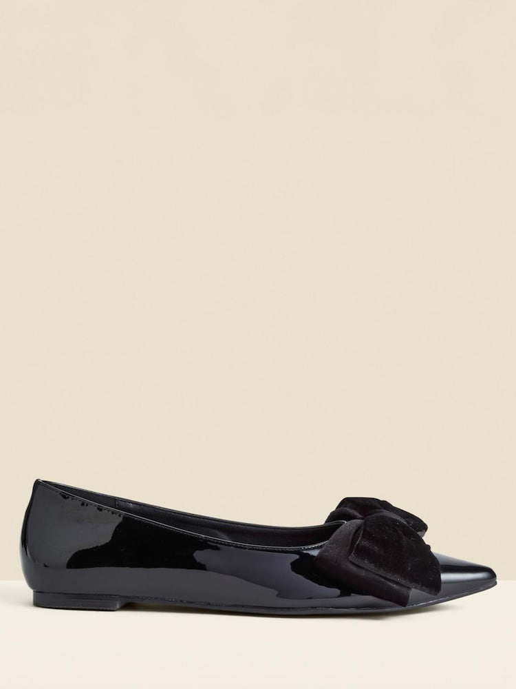 Sosandar Black Patent Ballet Pumps With Velvet Bow - Image 1 of 4 Sosandar Black Patent Ballet Pumps With Velvet Bow - Image 1 of 4