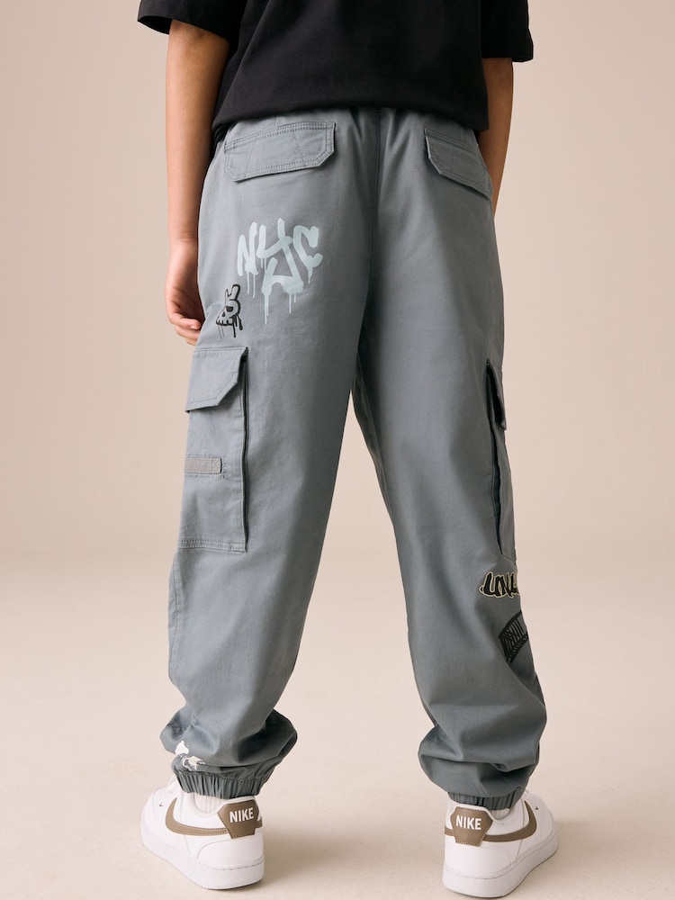 Blue Graffiti Cargo Trousers (3-16yrs) - Image 2 of 8 Blue Graffiti Cargo Trousers (3-16yrs) - Image 2 of 8