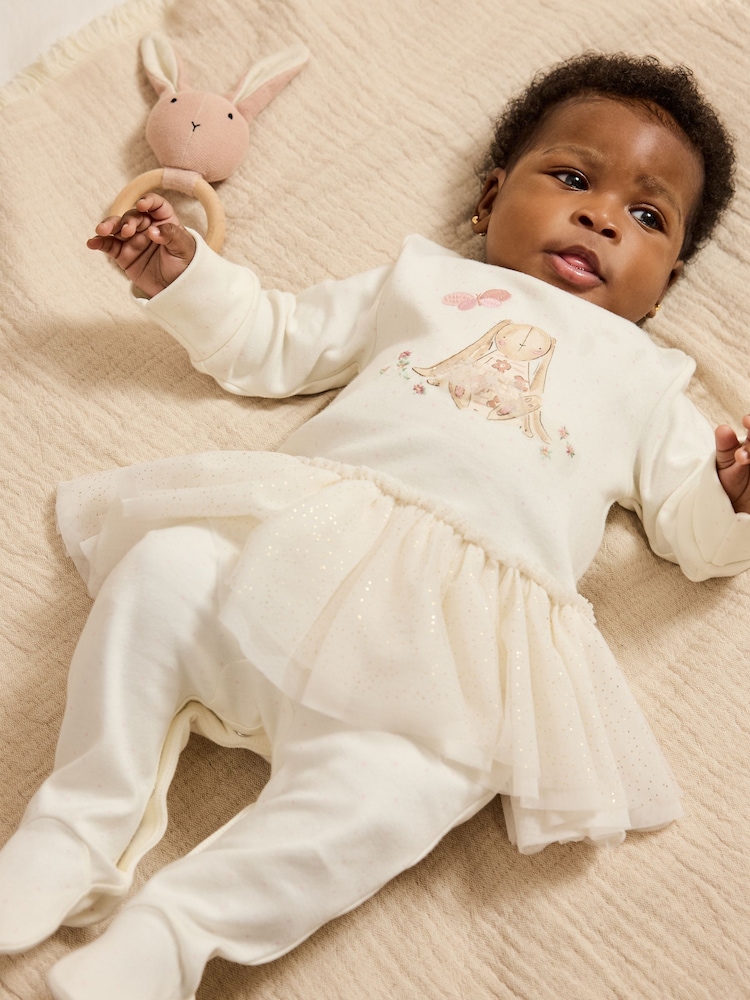 تنورة بكشكشة أرنب بلون بيج فاتح - Baby Sleepsuit (0mths-2yrs) - صورة 2 من 10 تنورة بكشكشة أرنب بلون بيج فاتح - Baby Sleepsuit (0mths-2yrs) - صورة 2 من 10