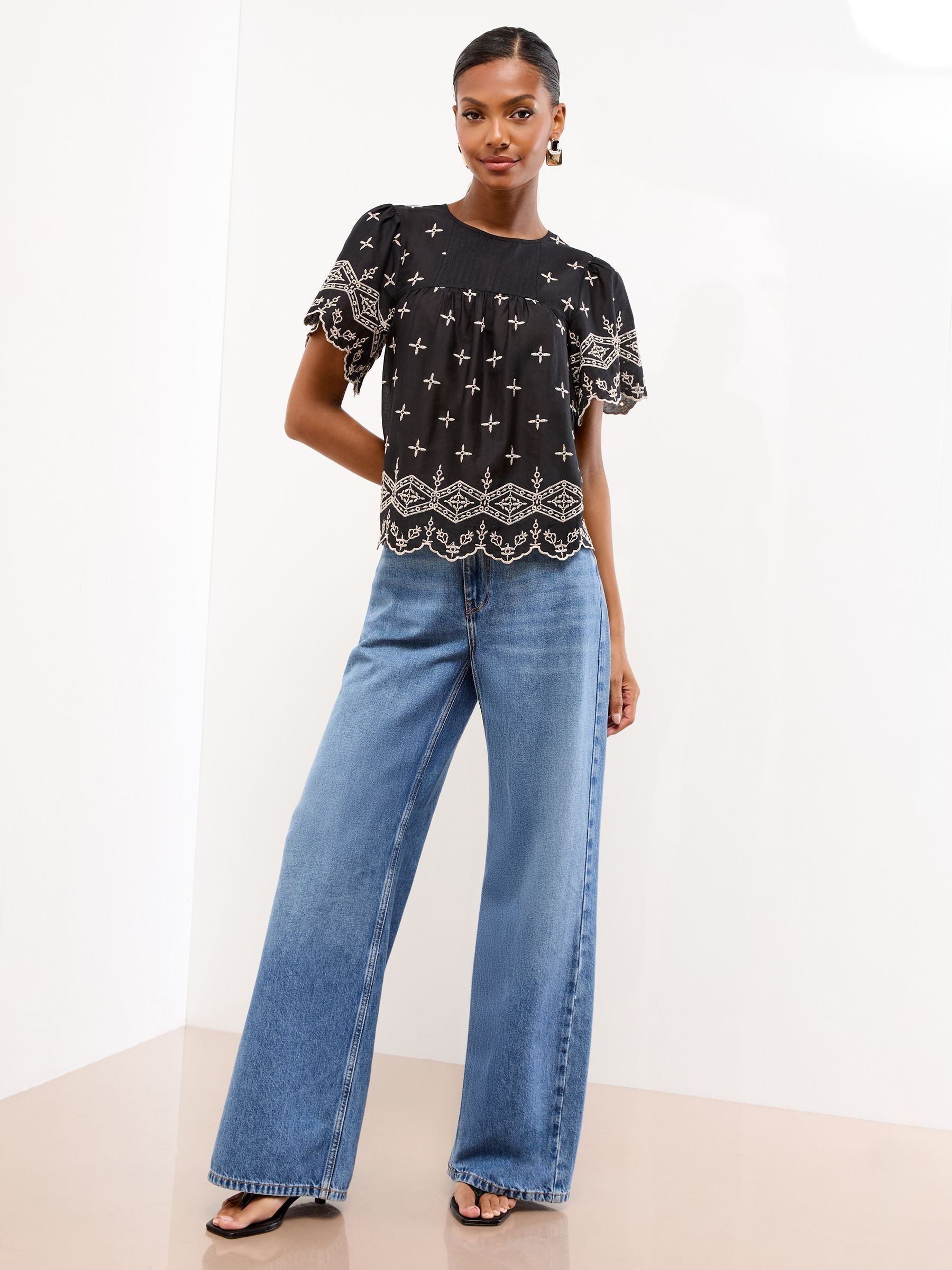 Buy Lipsy Black Broderie Flutter Sleeve T-Shirt from the Next UK