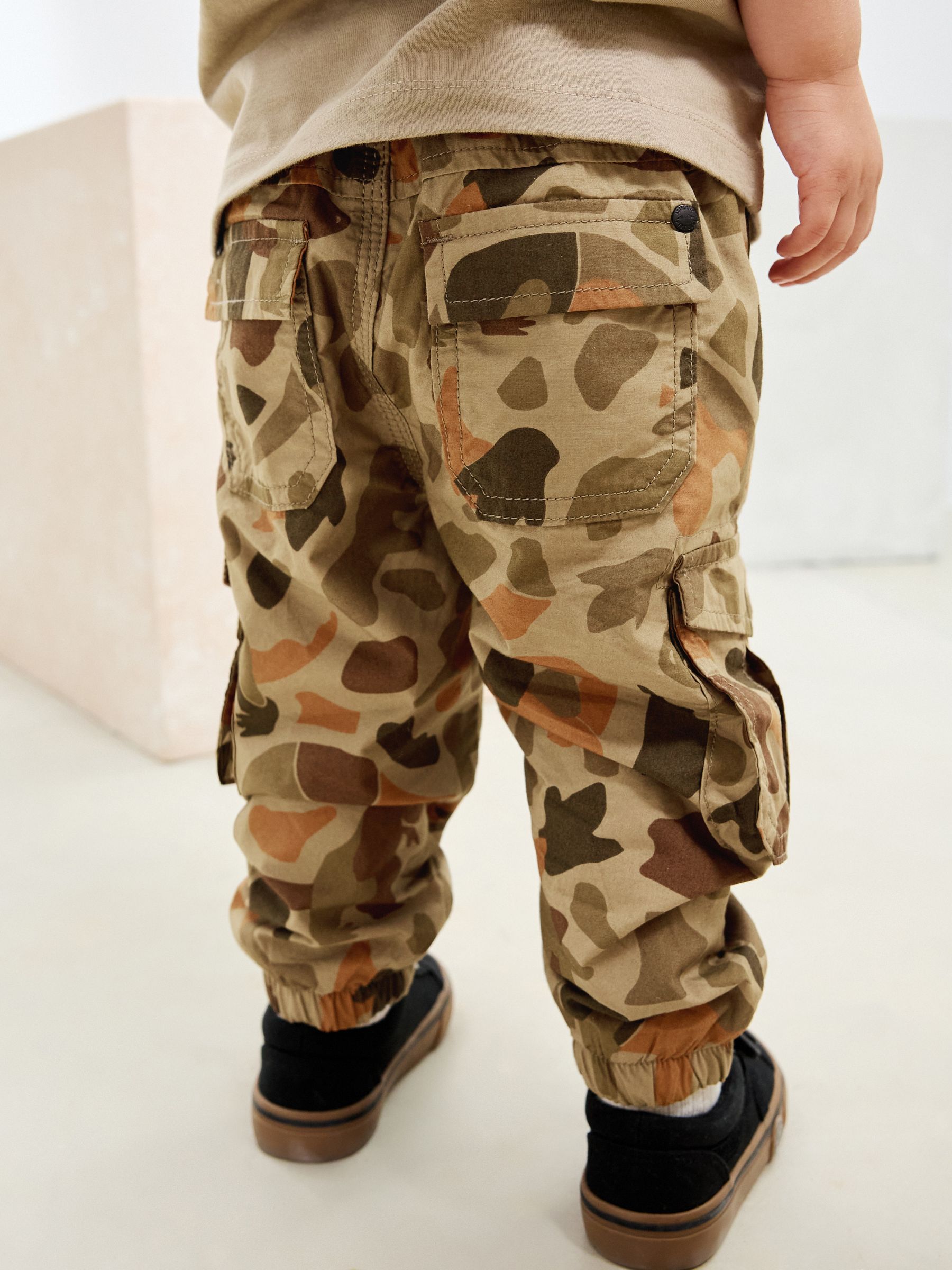 Buy Khaki Camo Dino Print Lined Cargo Trousers (3mths-7yrs) from
