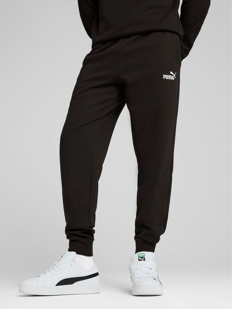 Puma Charcoal Black ESS No 1 Logo Joggers Fleece Cuffed Leg - Image 1 of 5 Puma Charcoal Black ESS No 1 Logo Joggers Fleece Cuffed Leg - Image 1 of 5
