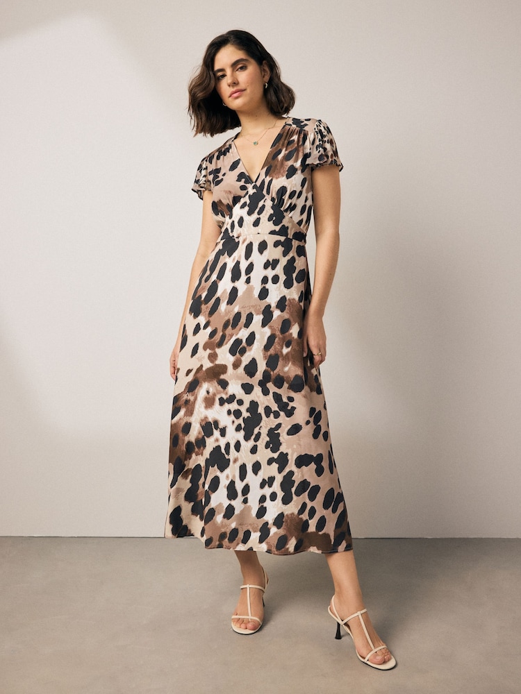 Brown Cow Animal Print Flutter Sleeve V-Neck Tie Waist Maxi Dress - Image 1 of 7