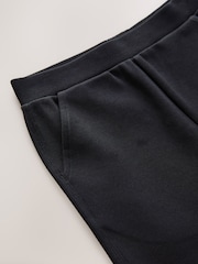 Negro - Pantalones escolares acampanados de algodón elástico y Stretch (3-17años) - Imagen 9 de 10