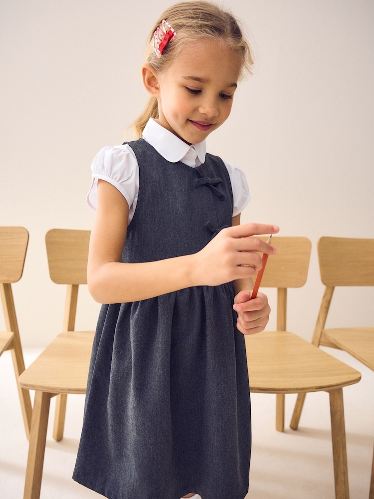 Grey Asymmetric Bow Front School Pinafore Dress (3-14yrs) - Image 1 of 8 Grey Asymmetric Bow Front School Pinafore Dress (3-14yrs) - Image 1 of 8