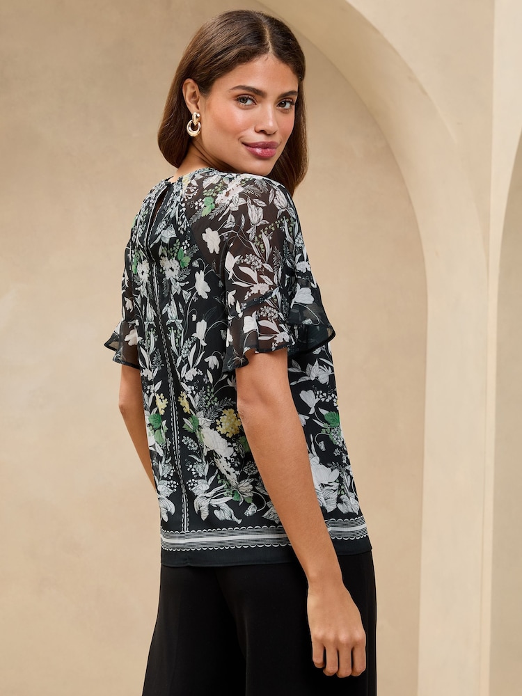 Schwarz mit floralem Print - Lipsy – Bluse mit transparenten Rüschenärmeln - Image 4 of 4