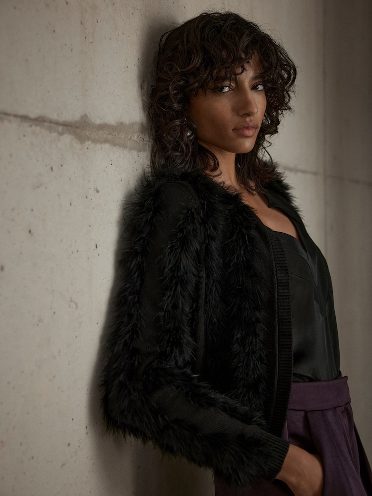 Mint Velvet Black Feather Shrug Cardigan - Image 1 of 7 Mint Velvet Black Feather Shrug Cardigan - Image 1 of 7