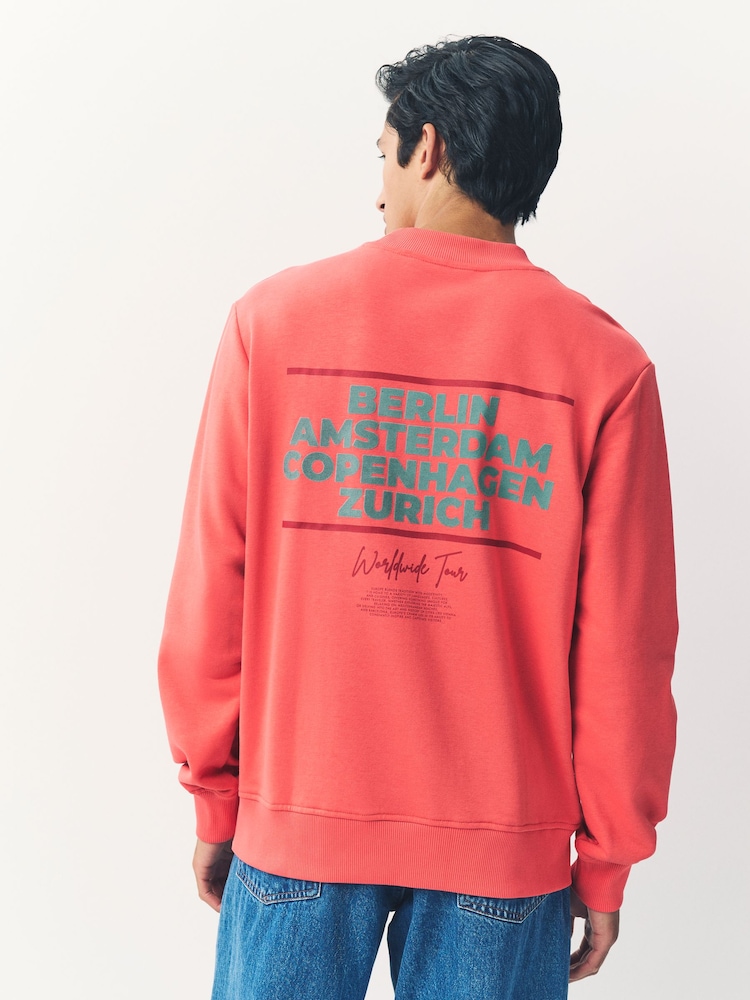 Coral Pink Cotton Rich Crew Graphic Print Sweatshirt - Image 1 of 8 Coral Pink Cotton Rich Crew Graphic Print Sweatshirt - Image 1 of 8