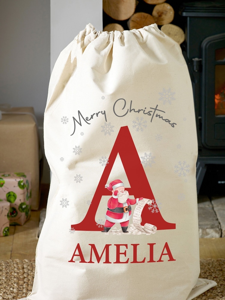 Personalised 100% Cotton Initial & Santa Sack by Loveabode - Image 1 of 4 Personalised 100% Cotton Initial & Santa Sack by Loveabode - Image 1 of 4