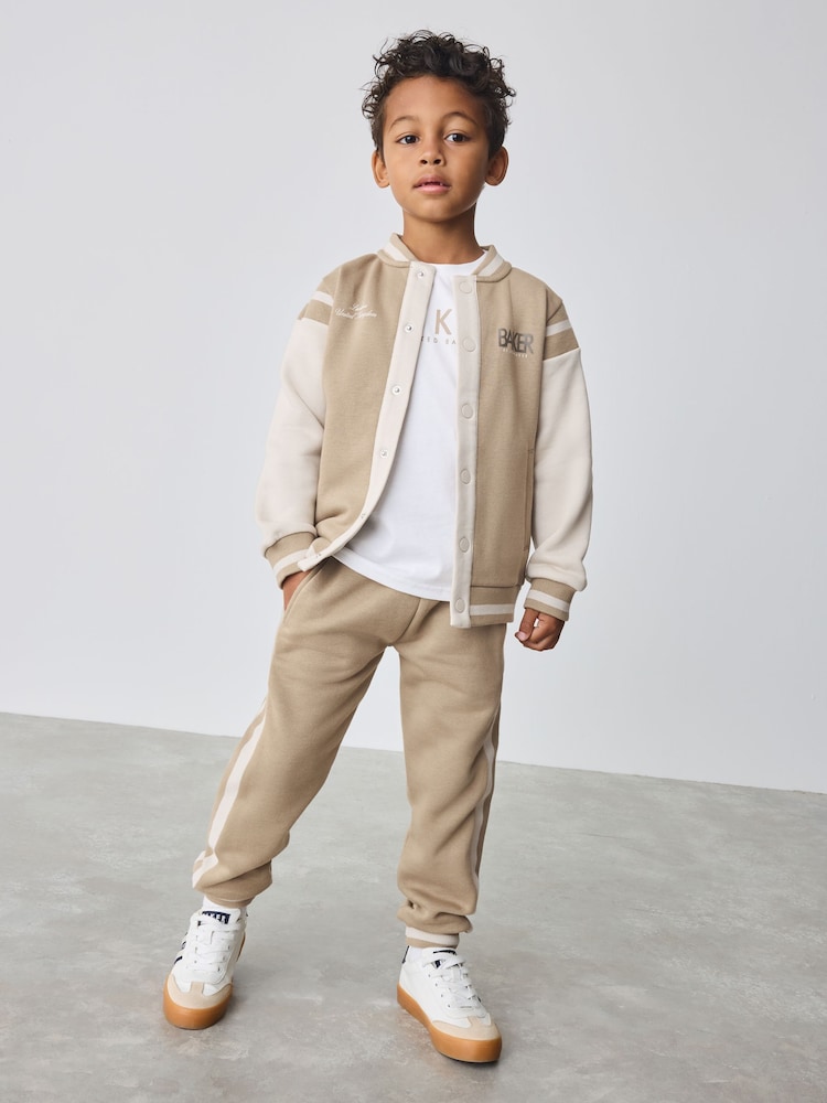 Baker by Ted Baker Stone Varsity Jacket T-Shirt and Joggers Set - Image 1 of 19 Baker by Ted Baker Stone Varsity Jacket T-Shirt and Joggers Set - Image 1 of 19