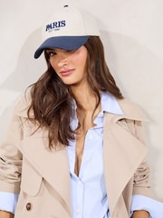 Lipsy Cream and Navy Embriodered Graphic Cap - Image 1 of 6