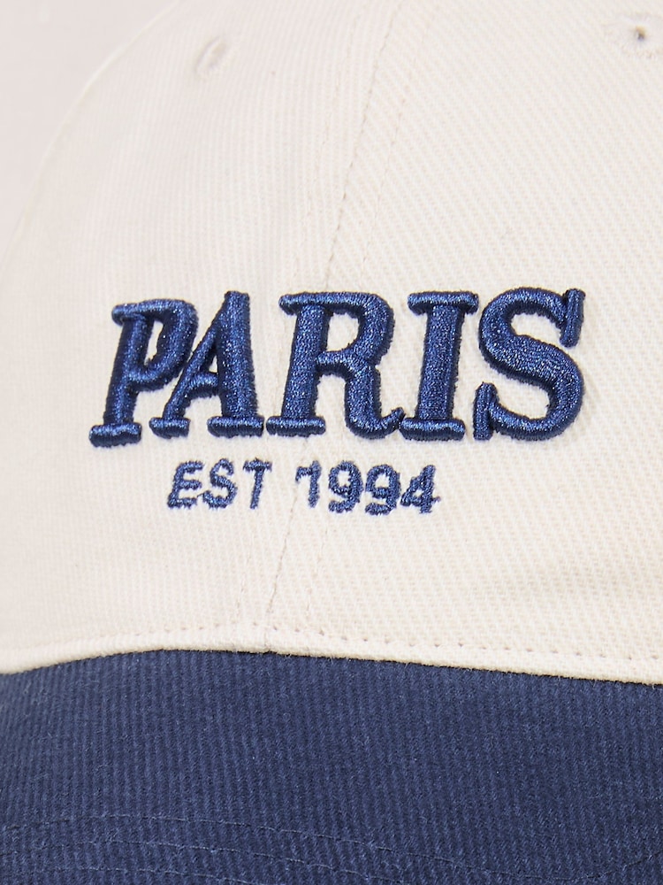 Lipsy Cream and Navy Embriodered Graphic Cap - Image 2 of 6
