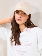 Lipsy Cream and Pink Embriodered Graphic Cap - Image 1 of 6