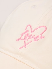 Lipsy Cream and Pink Embriodered Graphic Cap - Image 2 of 6