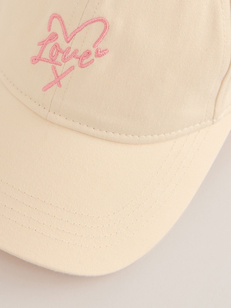 Lipsy Cream and Pink Embriodered Graphic Cap - Image 6 of 6