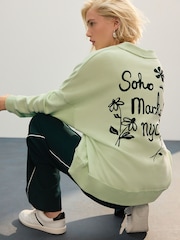 Green NYC Back Graphic Boyfriend Oversized Varsity Style Jersey Longline Cardigan - Image 1 of 8