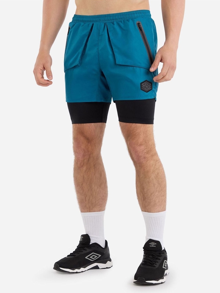 Azul - Pantalones cortos deportivos Elite Pro Hybrid de Umbro - Imagen 1 de 5