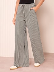 Friends Like These Black Stripe Petite Crinkle Jersey Wide Leg Trousers - Image 1 of 4