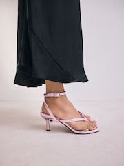 Pink Metallic Forever Comfort® Round Toe Post Ankle Wrap Heels - Image 1 of 8