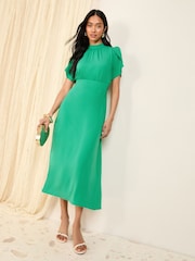 Friends Like These Green High Neck Short Sleeve Midi Dress with Bow Detailing - Image 1 of 5