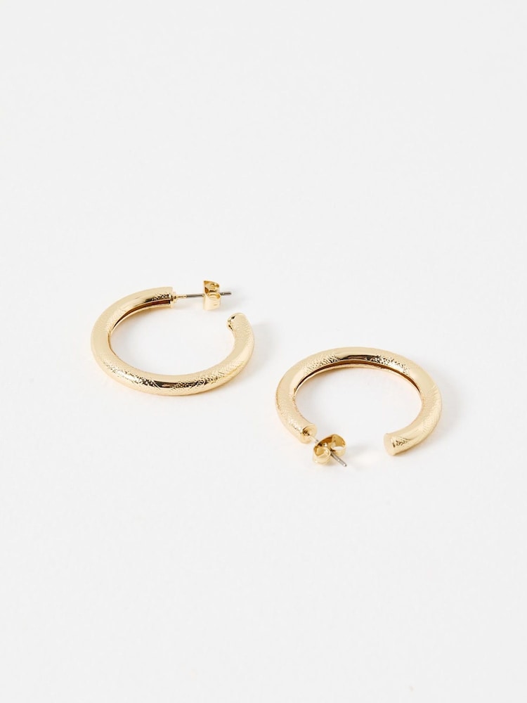 Oliver Bonas Gold Tone Ziada Textured Small Hoops - Image 2 of 3 Oliver Bonas Gold Tone Ziada Textured Small Hoops - Image 2 of 3