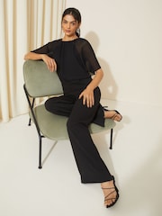 Friends Like These Black Petite Chiffon Flutter Sleeve Wide Leg Jumpsuit - Image 3 of 4