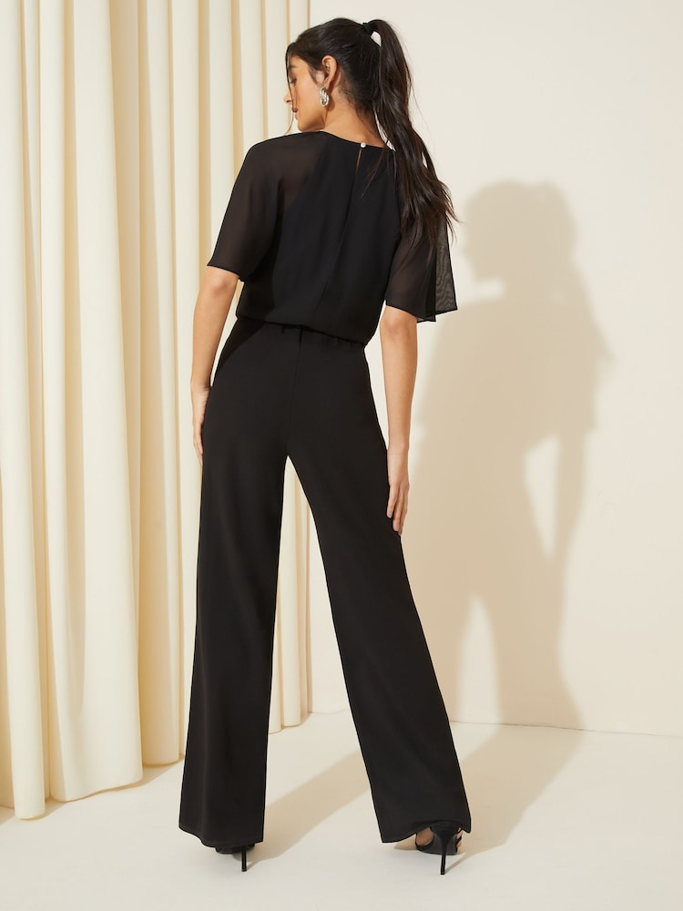 Friends Like These Black Petite Chiffon Flutter Sleeve Wide Leg Jumpsuit - Image 4 of 4