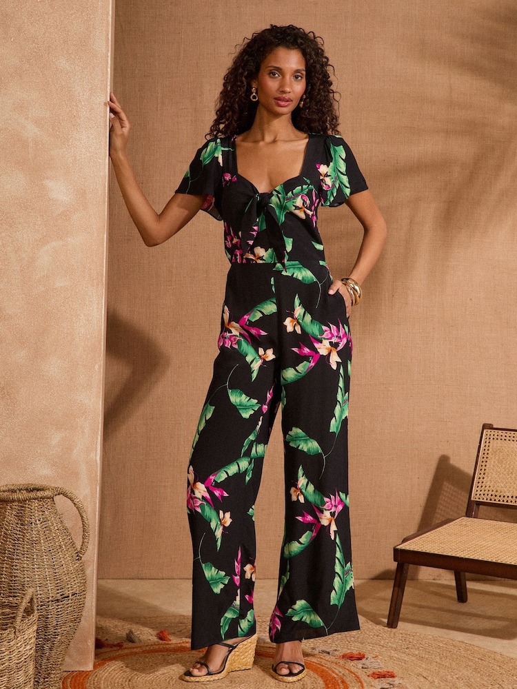Love & Roses Tie Front Flutter Sleeve Jumpsuit - Imagen 1 de 4