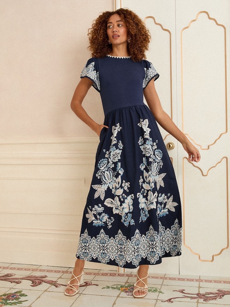Love & Roses Navy Floral Print Flutter Sleeve Jersey Maxi Dress - Image 1 of 4 Love & Roses Navy Floral Print Flutter Sleeve Jersey Maxi Dress - Image 1 of 4