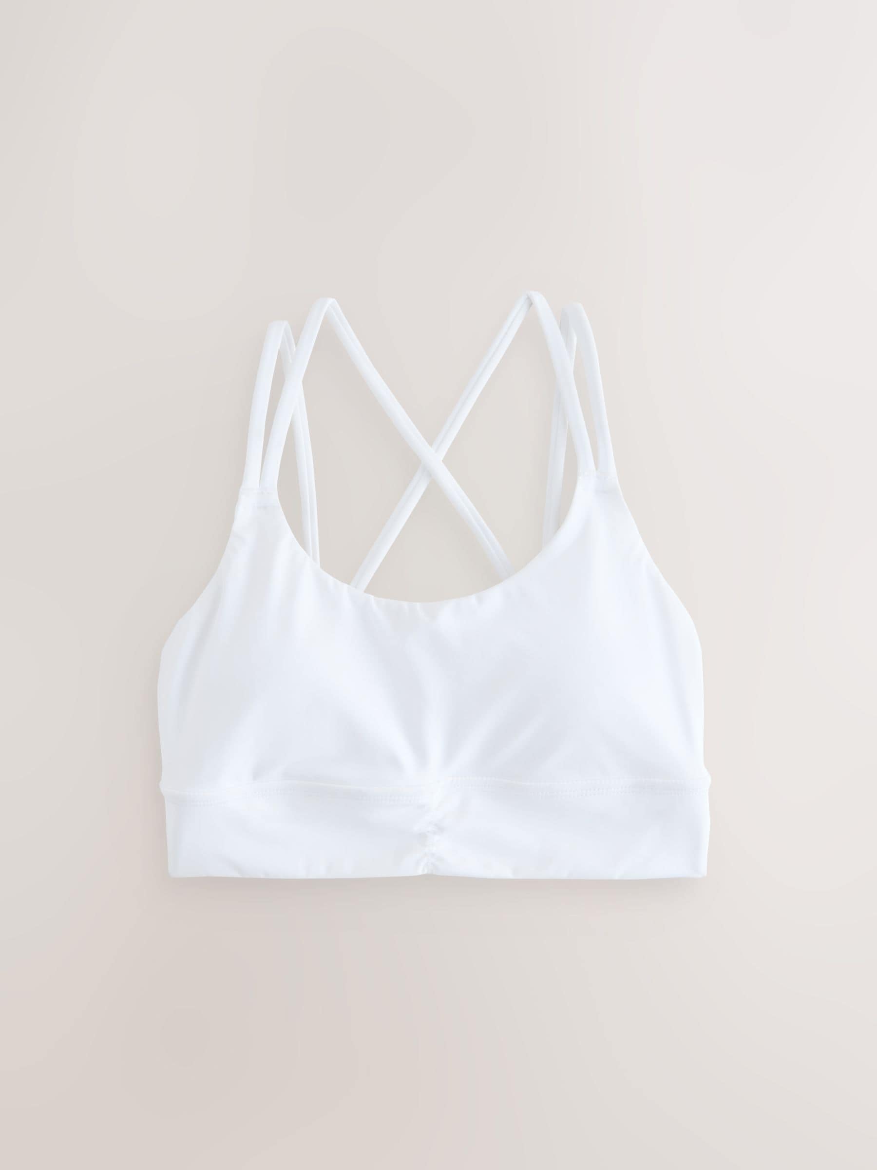 Buy White Medium Impact Strappy Back Sports Bra from Next Singapore