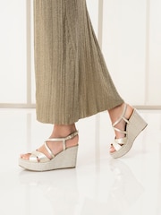 NeroGiardini Gold Leather Woven Wedge Sandals - Image 1 of 6