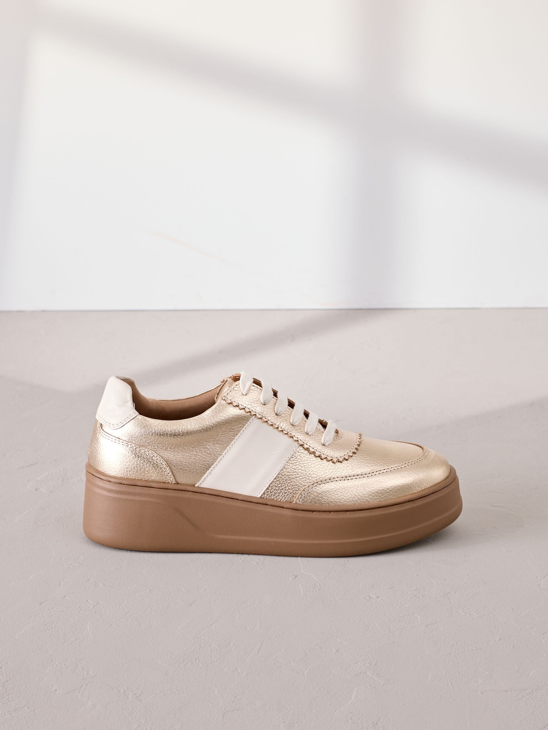 Buy Gold Signature Leather Chunky Wedge Platform Trainers from