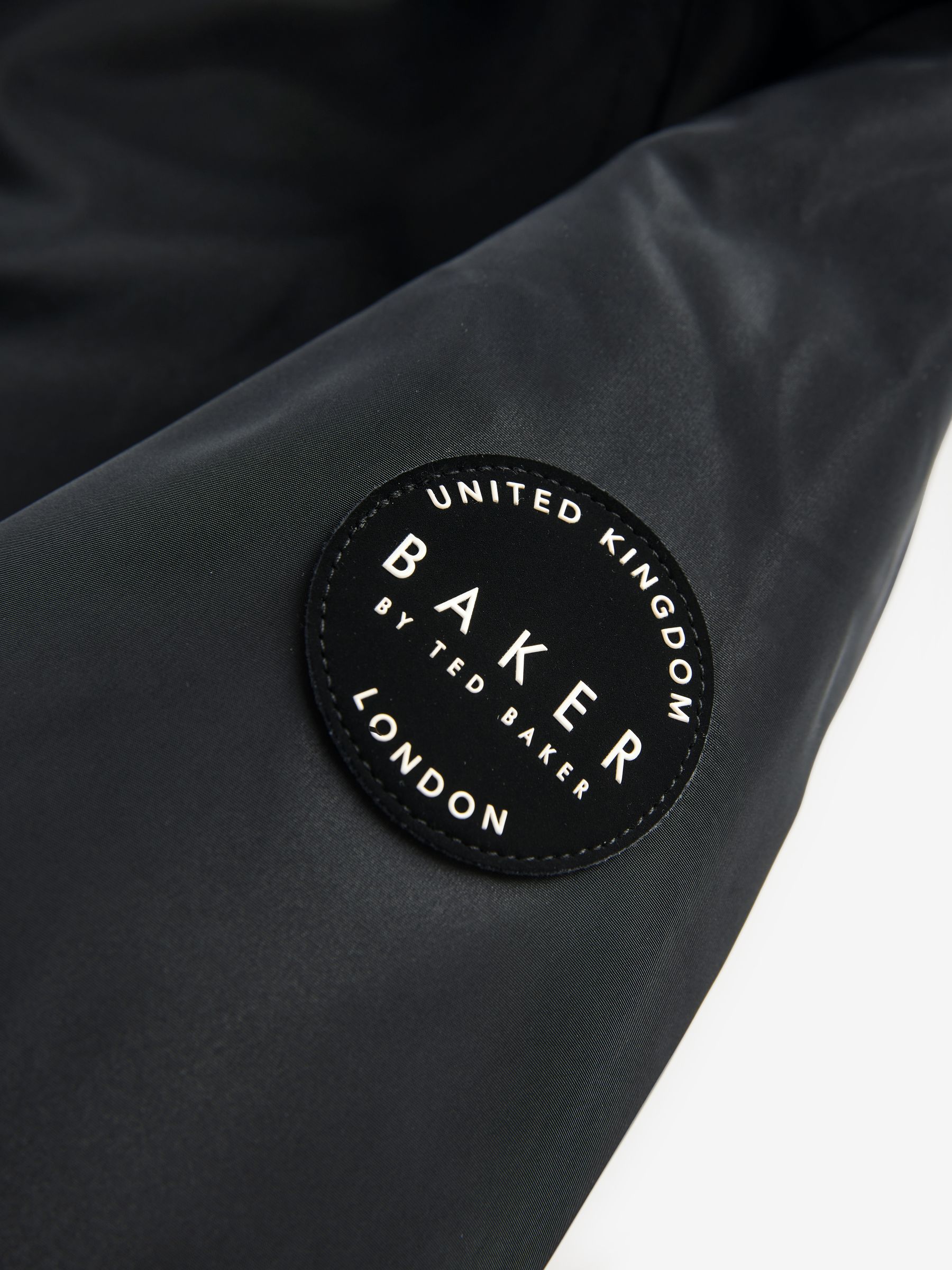 Buy Baker by Ted Baker Shower Resistant Pleated Raincoat from Next USA